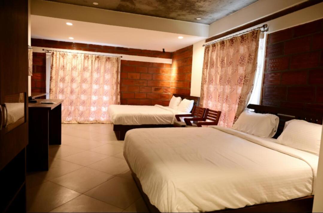 מדיקרי Coorg Vismaya Resort מראה חיצוני תמונה